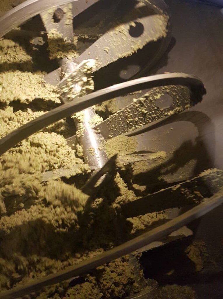 olives pasta composition in mixer at 'Pamako' olive oil plant